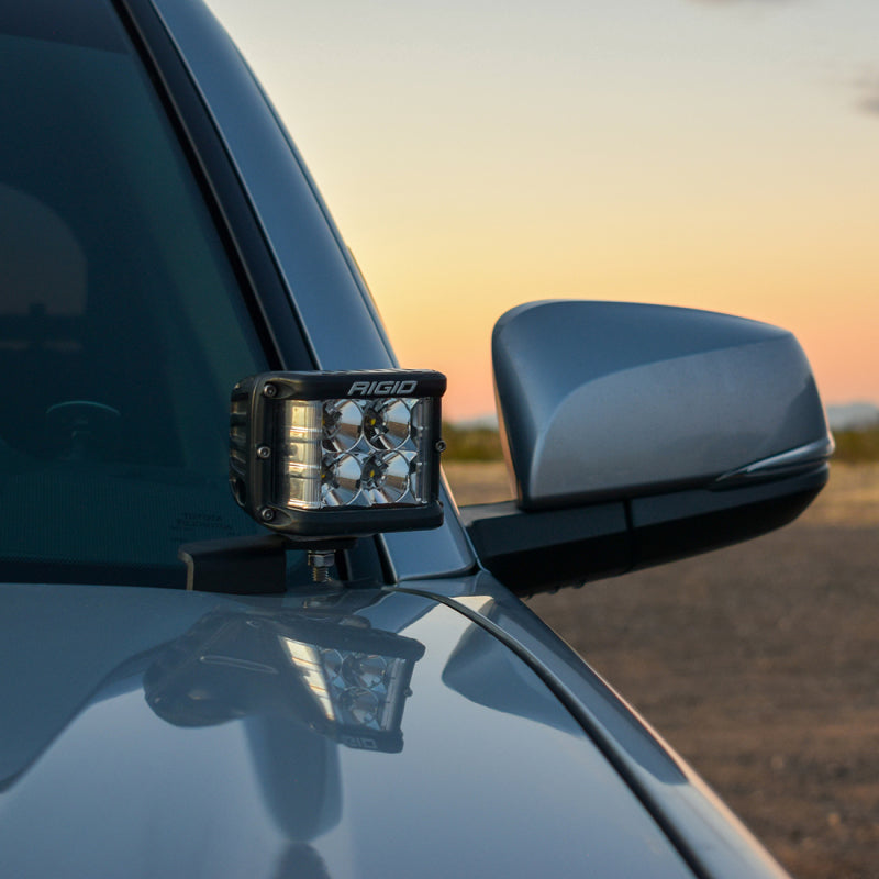 Rigid D-SS Flood A-Pillar Light Kit, D-SS pod on the A-pillar of a Toyota Tacoma beside the mirror