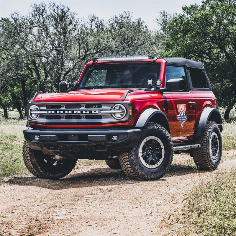 Rigid Roof Line Mount Kit installed on a red Ford Bronco with a roof light bar