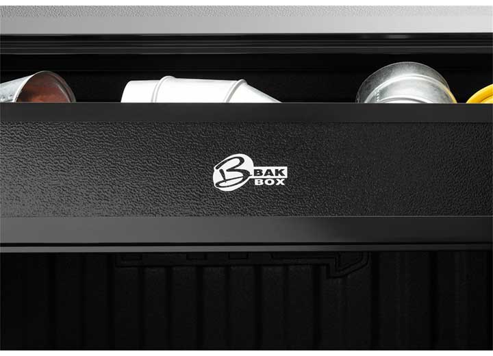 Close-up of the BAK BAKBox 2 badge on the fold-away FRP panel