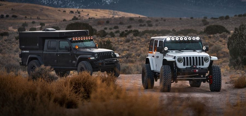 KC HiLiTES Gravity Titan LED Light Bar, two Jeeps on a desert trail with Gravity Titan light bars on the roof