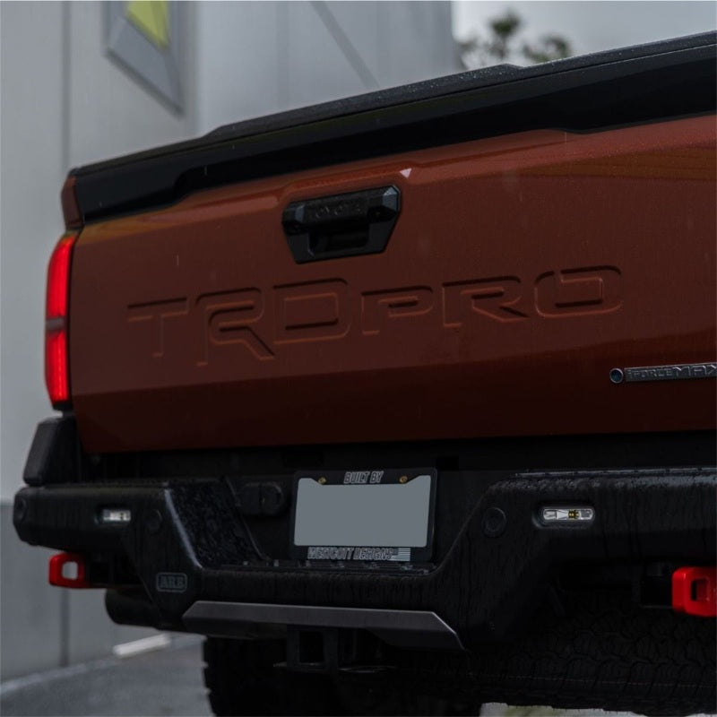 Rigid ARB Rear Bumper SR-L Light Kit installed in the rear bumper of a Toyota Tacoma TRD Pro