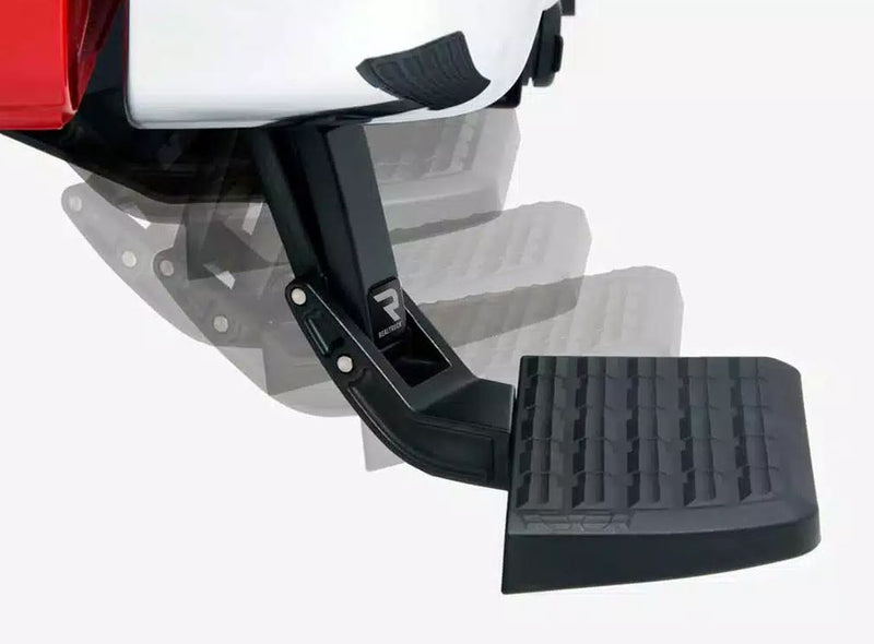 Multiple-exposure image of the BedStep swinging down from under a white bumper to its deployed position