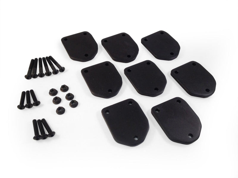Eight black rubber pads with screws and nuts, BedXTender mounting kit on white