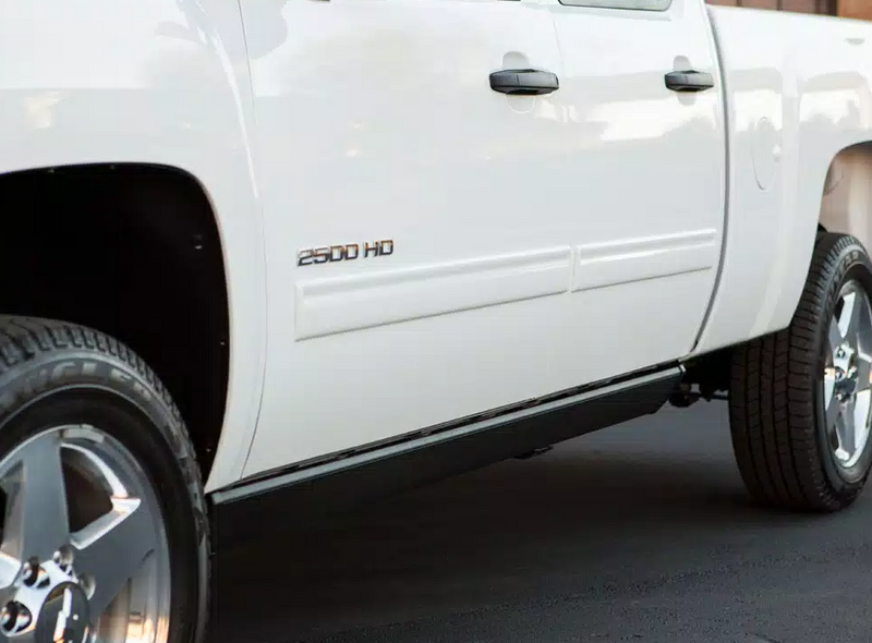 White heavy-duty pickup door panels with the running board tucked beneath, second angle
