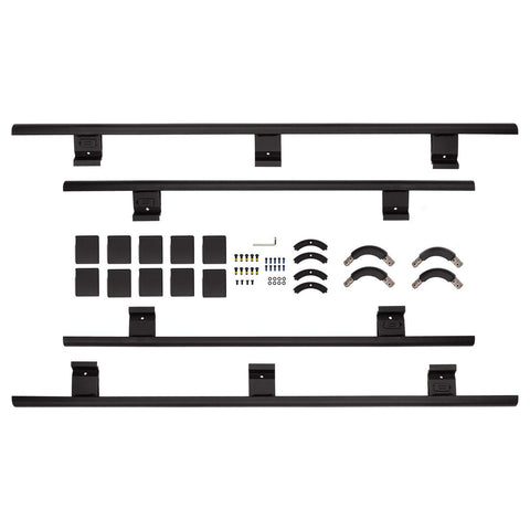 ARB BASE Rack full guard rail kit laid out on white: four rail sections, mounting brackets, pads and hardware