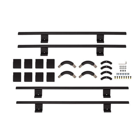 ARB BASE Rack full guard rail kit laid out on white: four rail sections, mounting brackets, pads and hardware