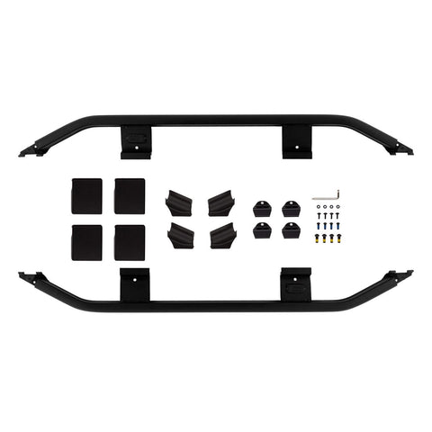 ARB BASE Rack trade guard rail kit laid out on white: two side rails, mounting brackets, pads and hardware