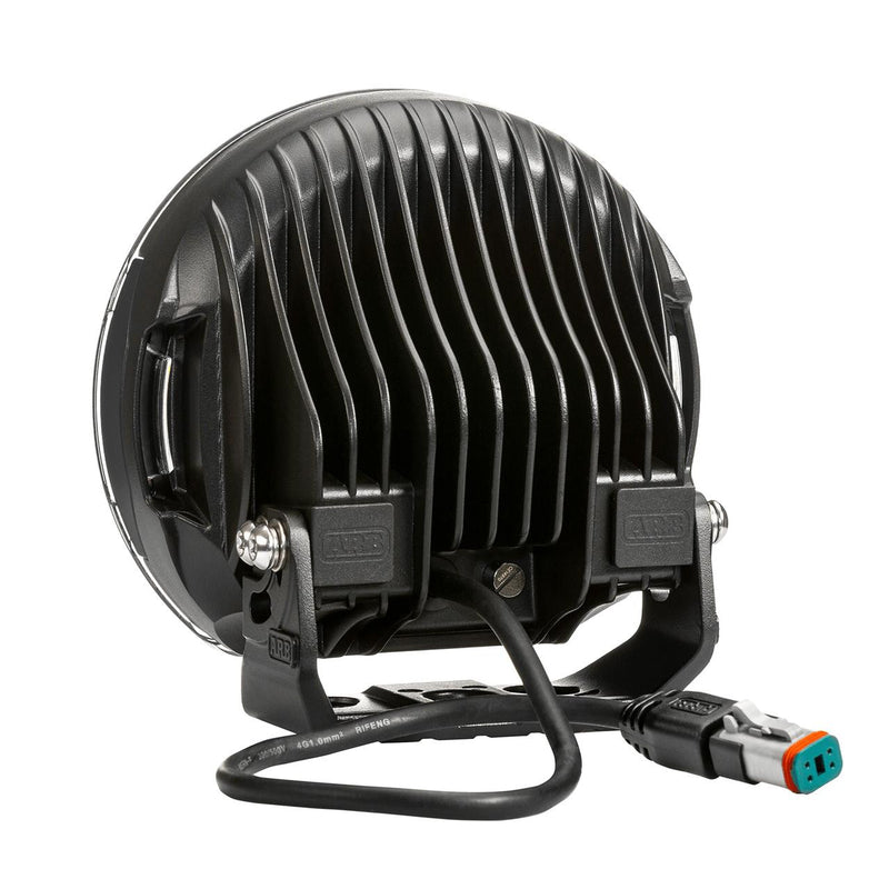 Rear of the ARB Intensity SOLIS LED driving light housing with cooling fins, mounting bracket and connector lead