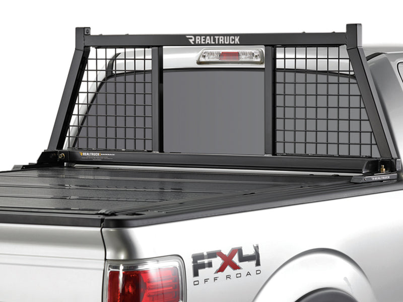 BackRack Half Safety: black half safety headache rack with mesh outer panels on a silver Ford F-150 FX4 with a hard folding tonneau cover