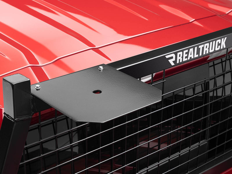 BackRack Light Brackets: A black light mounting plate extends from the corner post of a mesh headache rack on a red pickup