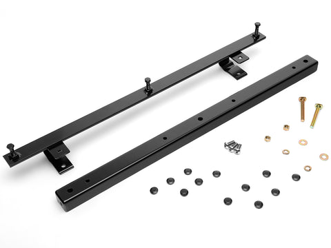 BackRack Light Brackets: two black steel mounting bars are laid out with bolts, nuts and plastic caps on white