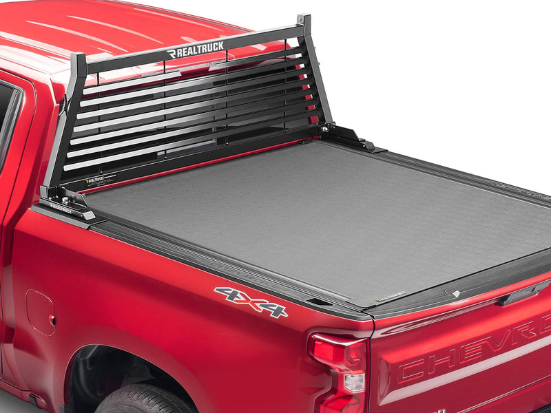 BackRack Louvered: A black louvered headache rack stands ahead of a closed tonneau cover on a red pickup
