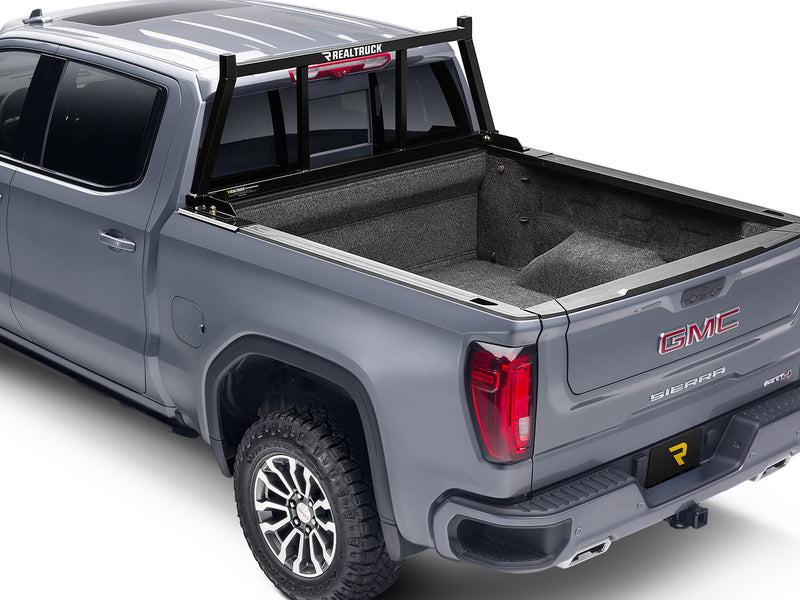 BackRack Open: A black open headache rack is mounted on a gray pickup with an open bed