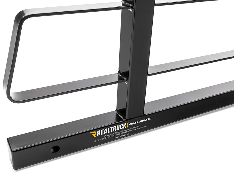 BackRack Original: close-up of a black Original headache rack base rail with the RealTruck BackRack label and grab handle