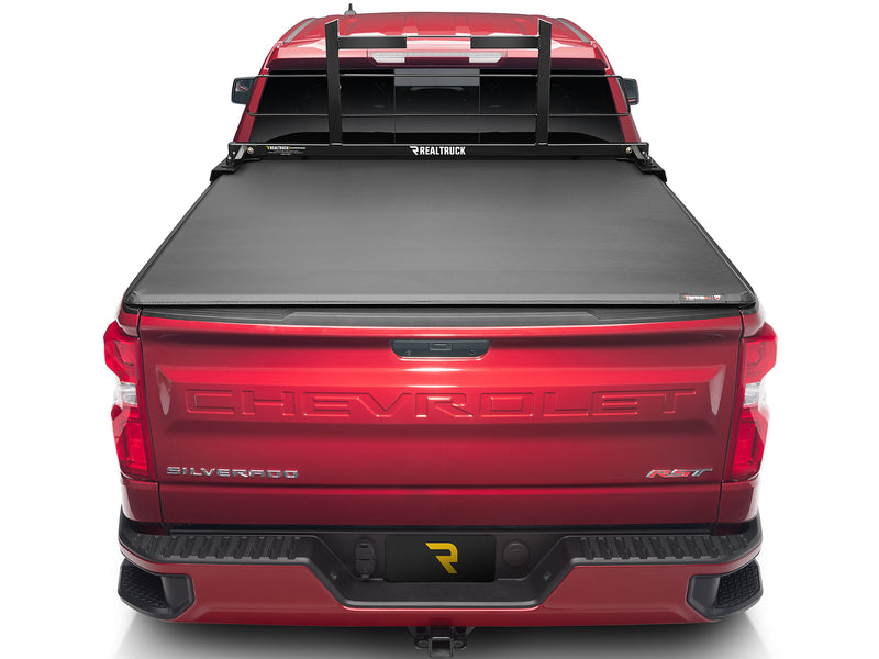 BackRack Original: rear view of a red Chevrolet Silverado with a black Original headache rack and a closed black tonneau cover