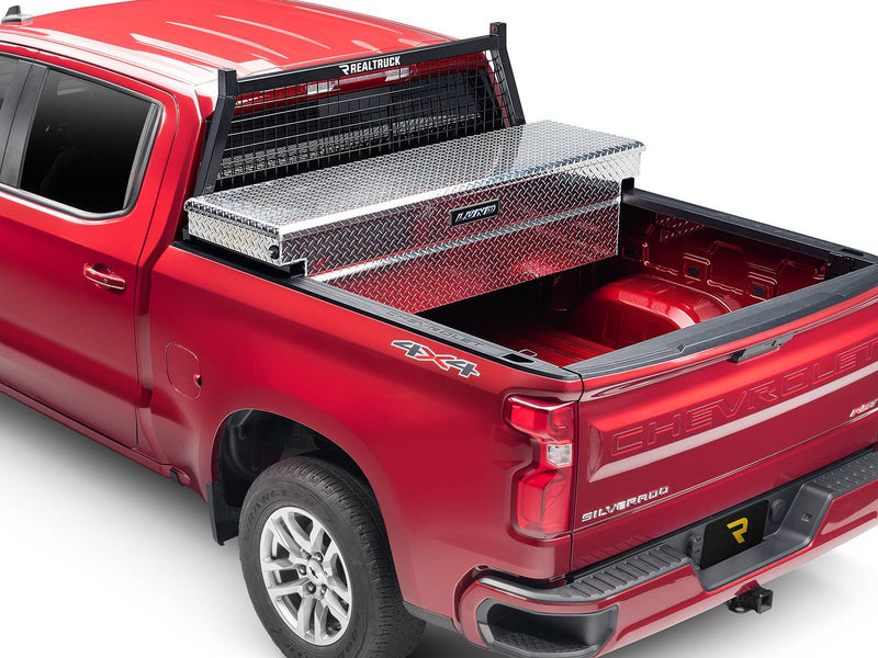 BackRack Safety: red pickup with a black Safety headache rack behind the cab and a diamond plate crossover toolbox across the bed