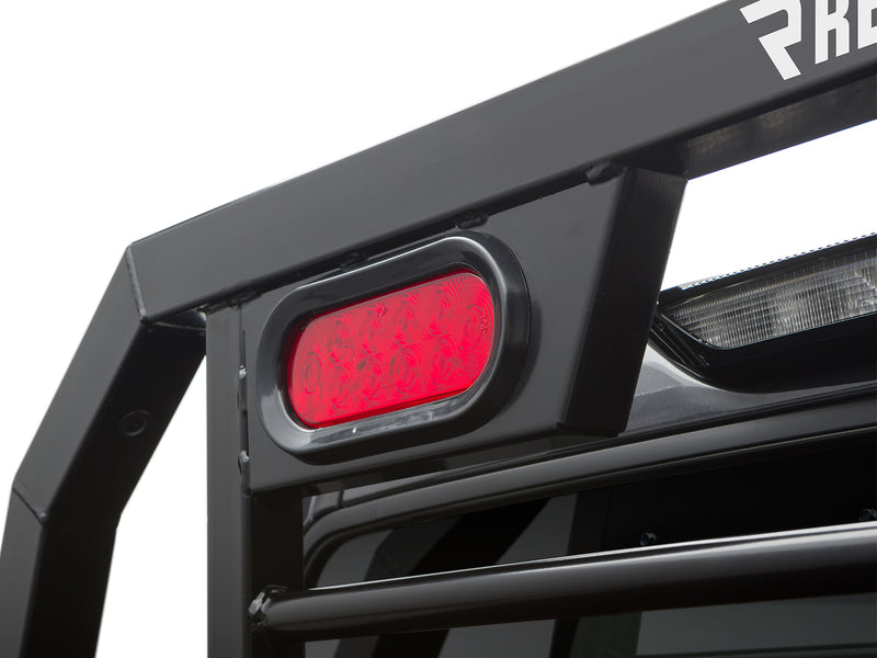 BackRack SRL: close-up of a black SRL headache rack corner with an integrated red oval LED light