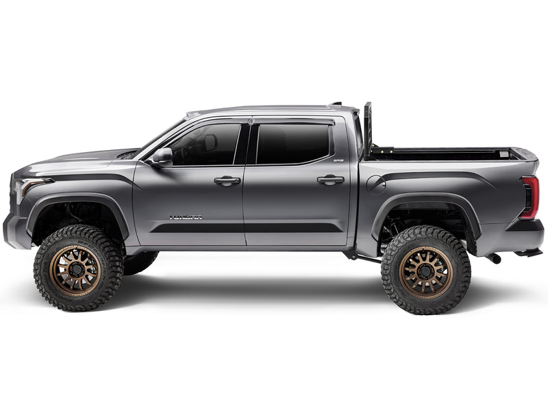 BackRack SRL: side profile of a lifted gray crew cab pickup with a black rack behind the cab