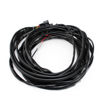 Baja Designs Automotive RTL Wiring Harness, whole product on a studio background: coiled black wiring harness with connector leads on a white background