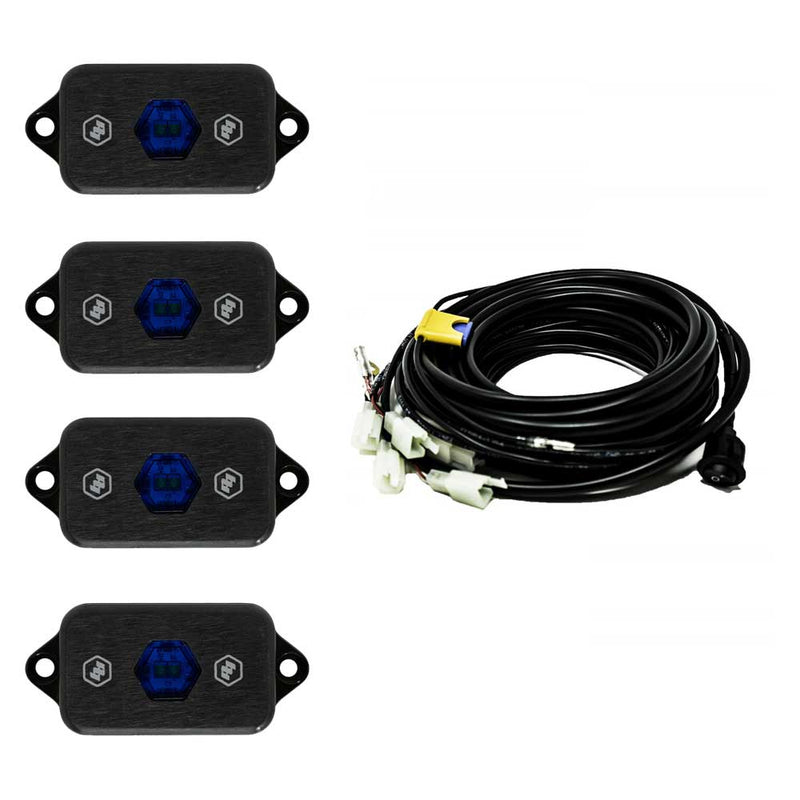 Baja Designs LED Rock Light Kit, complete kit on a studio background: four black LED rock light pods with blue centers shown with a coiled multi-lead wiring harness on white