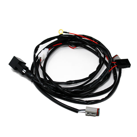 Baja Designs LP9 Sport Series Splitter 2-Light Max Wiring Harness, whole product on a studio background: black splitter wiring harness with relay plugs, ring terminal and gray DT connectors on white