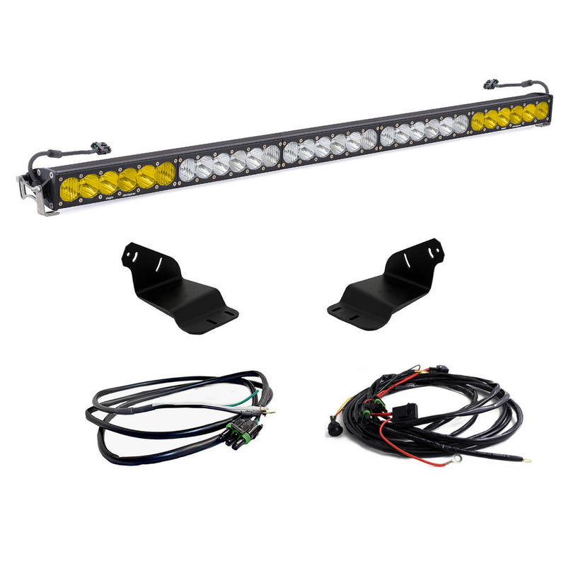 Baja Designs OnX6+ 50" Dual Control Roof Mount Light Kit, complete kit on a studio background: OnX6+ 50" light bar with amber ends and clear center, two roof brackets and two wiring harnesses on white
