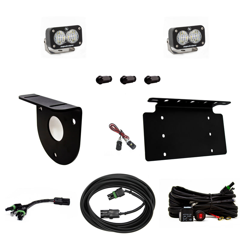 Baja Designs S2 Sport Dual Reverse Light Kit, complete kit on a studio background: pair of S2 Sport pods with a spare-tire bracket, license plate bracket, spacers, cables and a relay harness on white