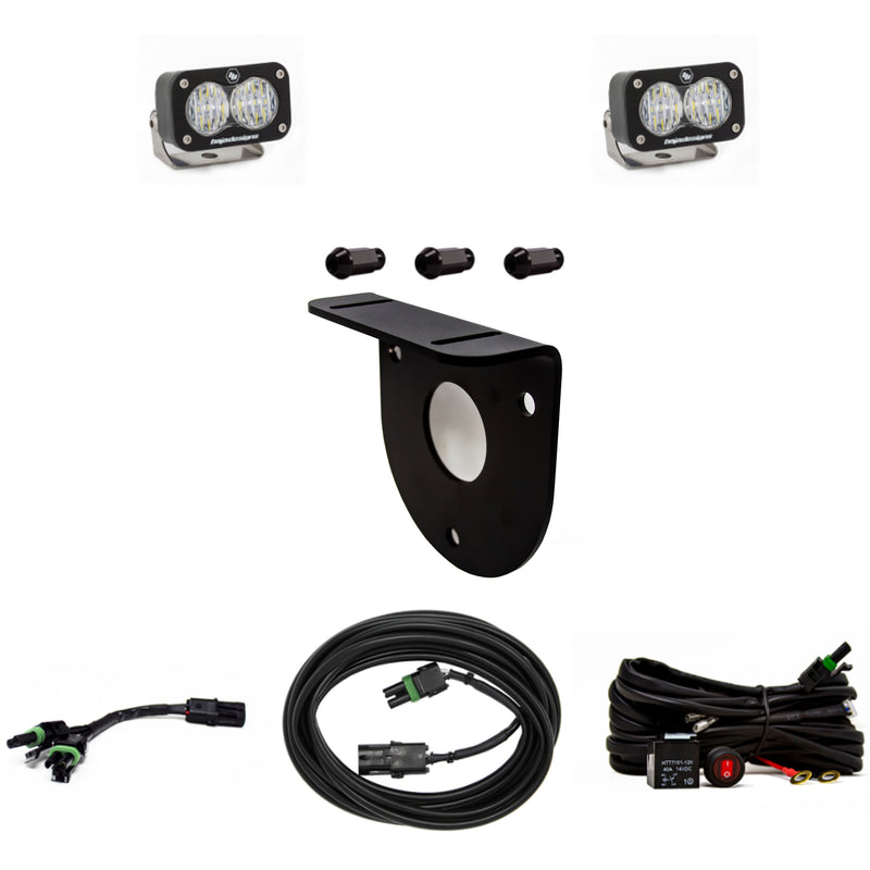 Baja Designs S2 Sport Dual Reverse Light Kit, complete kit on a studio background: pair of S2 Sport pods with a spare-tire bracket, spacers, an adapter, an extension cable and a relay harness on white