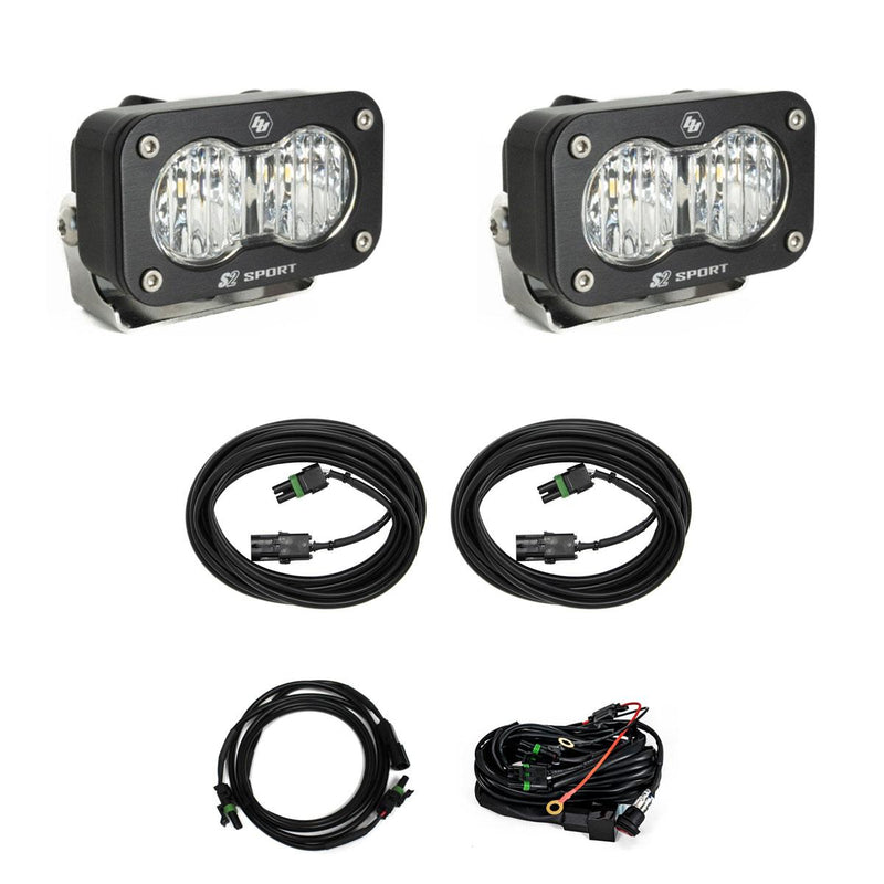 Baja Designs S2 Sport Dual Reverse Light Kit, complete kit on a studio background: two black S2 Sport LED pods with clear lenses shown with coiled harnesses and a relay wiring harness on white