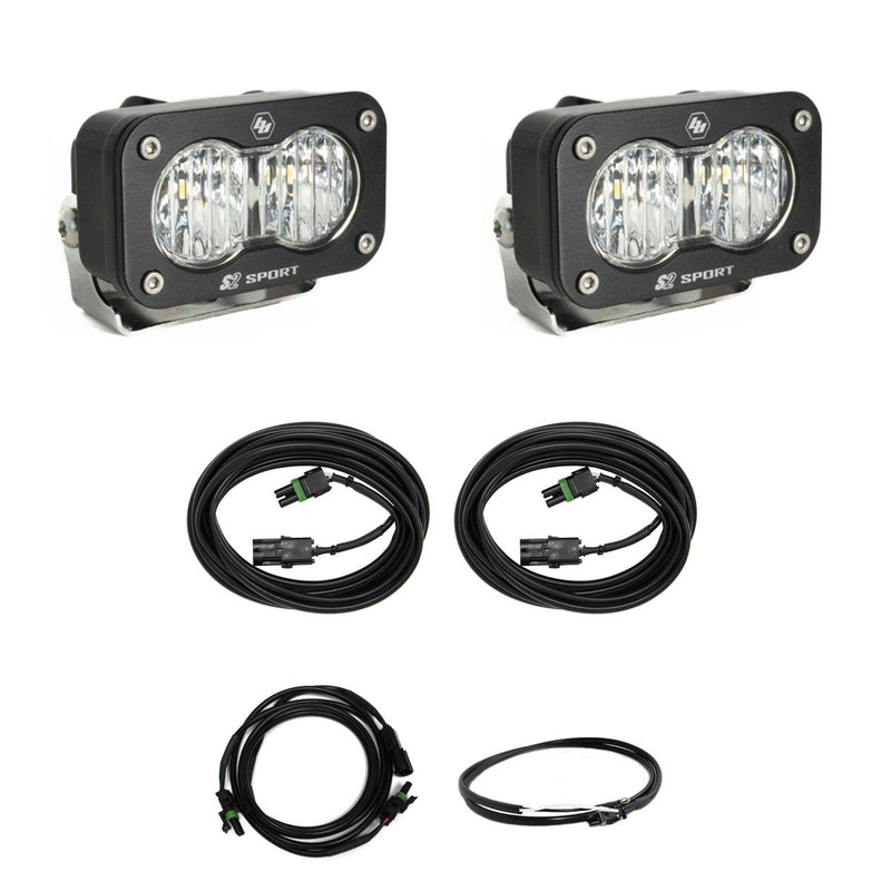 Baja Designs S2 Sport Dual Reverse Light Kit, complete kit on a studio background: two black S2 Sport LED pods with clear lenses shown with coiled extension harnesses and a short pigtail on white