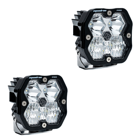 Baja Designs Squadron 2.0 Pro Black LED Auxiliary Light Pod Pair, whole product on a studio background: pair of black Squadron Pro pods with clear driving combo lenses, no harness, on white