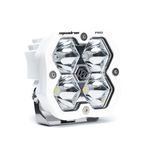 Baja Designs Squadron 2.0 Pro White LED Auxiliary Light Pod, whole product on a studio background: A white Baja Designs Squadron Pro LED pod with a clear spot lens on a white background