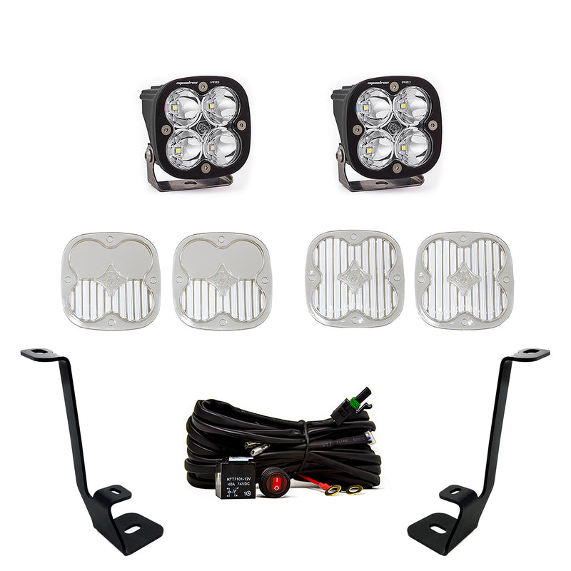 Baja Designs Squadron Pro A-Pillar Light Kit, complete kit on a studio background: two Squadron Pro LED pods with clear lenses, four lens covers, two A-pillar brackets and a wiring harness on white