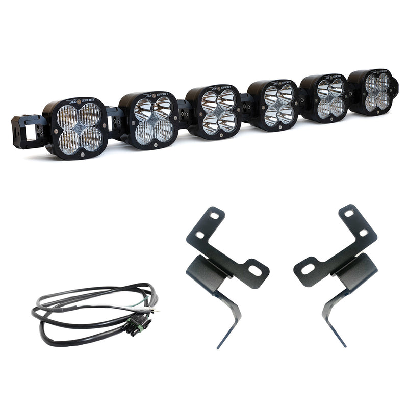 Baja Designs XL Linkable Bumper Light Kit, complete kit on a studio background: six XL linkable pods joined as one bar with two bent black brackets and a thin wiring harness on white