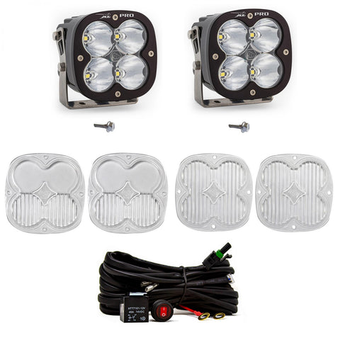 Baja Designs XL Pro A-Pillar Light Kit, complete kit on a studio background: two black XL Pro pods with clear lenses shown with mounting bolts, four clear lens covers and a switched relay harness on white