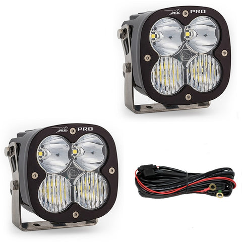 Baja Designs XL Pro Bumper Light Kit, complete kit on a studio background: two black XL Pro pods with clear lenses and wiring on white