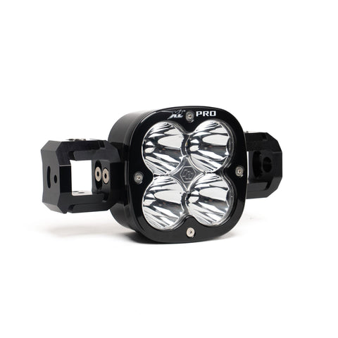 Baja Designs XL Pro Linkable Add-a-Light, whole product on a studio background: A single black XL Pro light pod with linking blocks on both sides and clear lenses on a white background