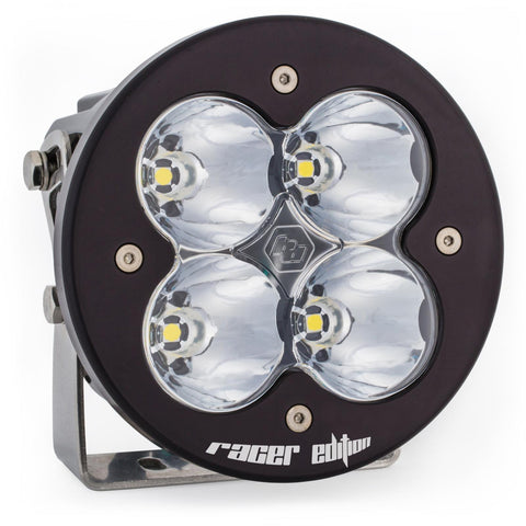 Baja Designs XL-R Racer Edition LED Auxiliary Light Pod, whole product on a studio background: A single black XL-R Racer Edition LED light pod