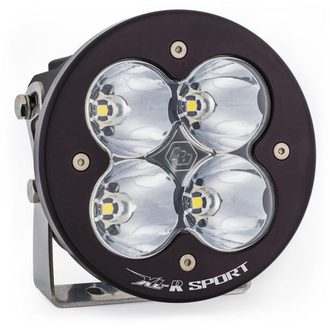 Baja Designs XL-R Sport LED Auxiliary Light Pod, whole product on a studio background: A single black round Baja Designs XL-R Sport LED light pod
