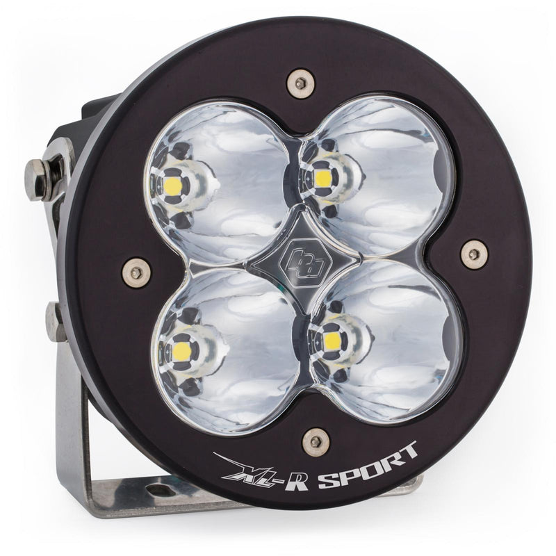 Baja Designs XL-R Sport LED Auxiliary Light Pod, whole product on a studio background: A single black round Baja Designs XL-R Sport LED light pod