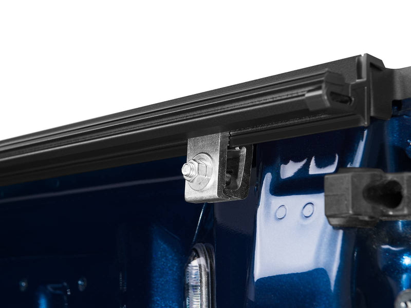 BAKFlip FiberMax no-drill clamp holding the rail to the bed