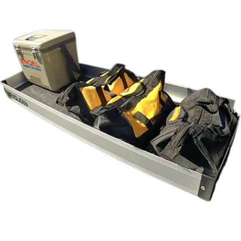 Silver BEDSLIDE upper BEDBIN tray, 16" x 48", shown loaded with a cooler and tool bags in a studio view on white