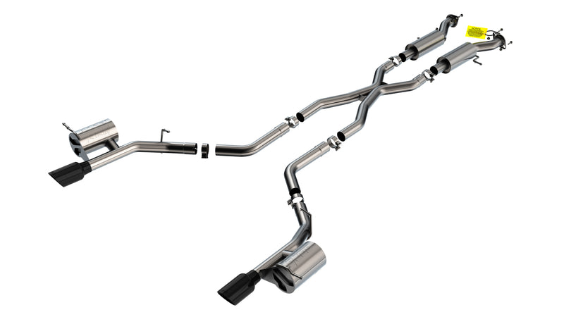 Borla ATAK Cat-Back Exhaust System, full system on a studio background: A stainless X-pipe cat-back exhaust with four mufflers and two black chrome tips laid out on a white background