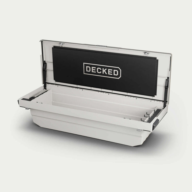 Industrial White DECKED Tool Box DTB2-WHT open in a studio view, showing the full-width tub, gas strut lid assist and the DECKED logo panel inside the lid