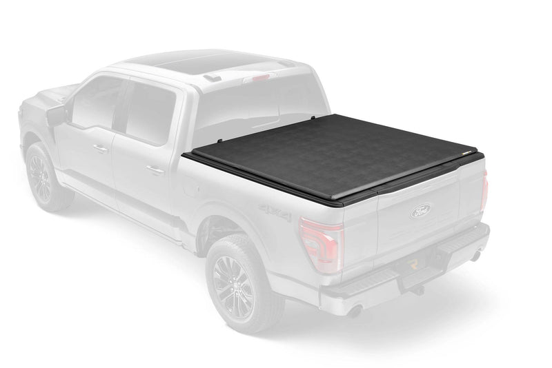 Soft tri-fold tonneau cover closed flat over the bed, studio render with the truck faded out