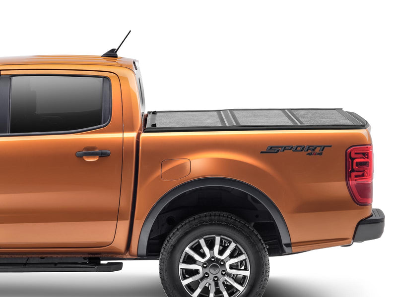 Gator EFX hard folding tonneau cover: Side view of an orange Ford Ranger with a closed low-profile hard tri-fold cover