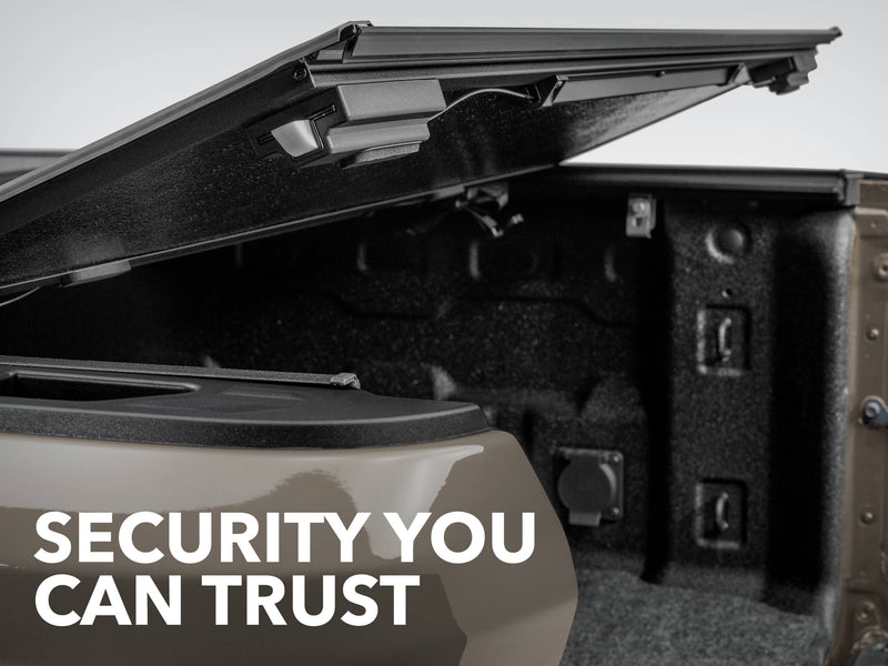 Gator FX hard folding tonneau cover: graphic 'Security you can trust' showing the panels lifted over the bed