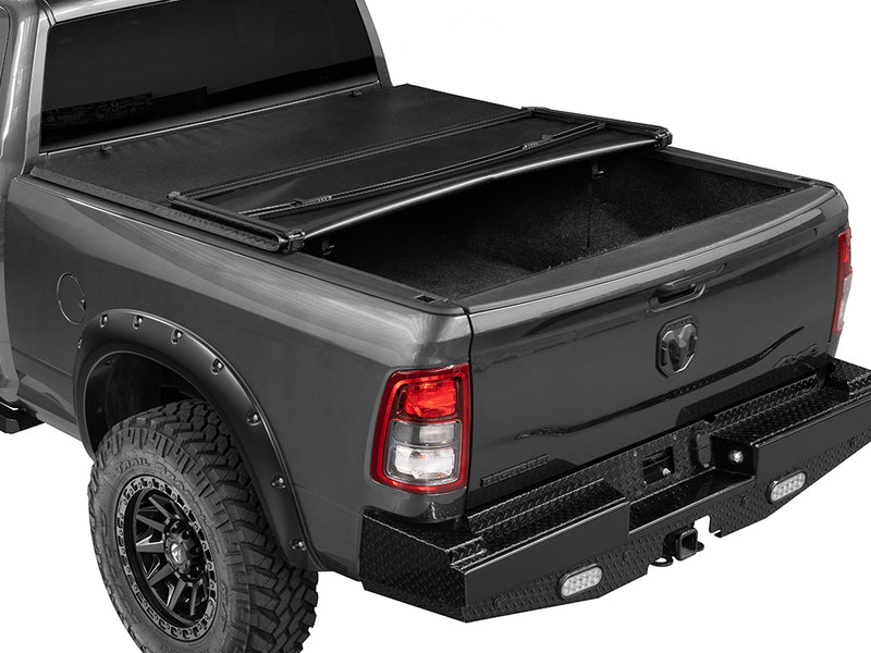 Gator SFX soft tri-fold tonneau cover: folded forward one section on a black Ram pickup