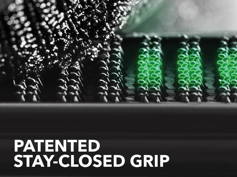 Close-up of the Gator SRX tonneau cover: close-up of hook and loop fastener strips with a green highlight and a stay-closed grip caption