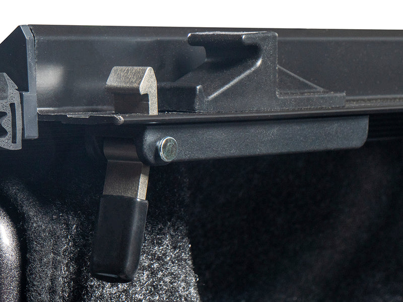 Gator SRX soft roll-up tonneau cover: Close-up of the rail hook and tension bar latch under a soft roll-up tonneau rail